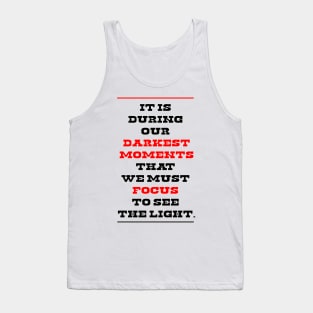 It is during our darkest moments that we must focus to see the light. Tank Top